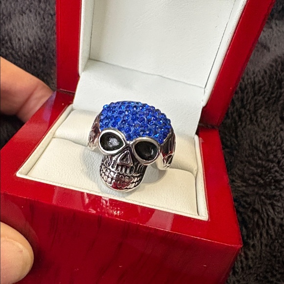 Jewelry - Stainless Steel Skull Ring with Blue Crystal Top. 
Beautiful Vivid Blue Sparkle.
